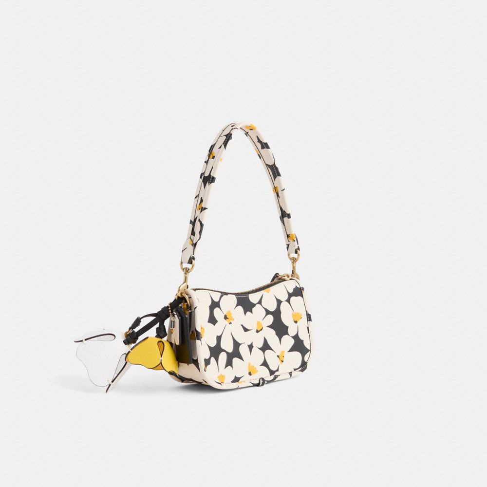 COACH®,Upcrafted Swinger Bag 20 With Floral Print,,Angle View