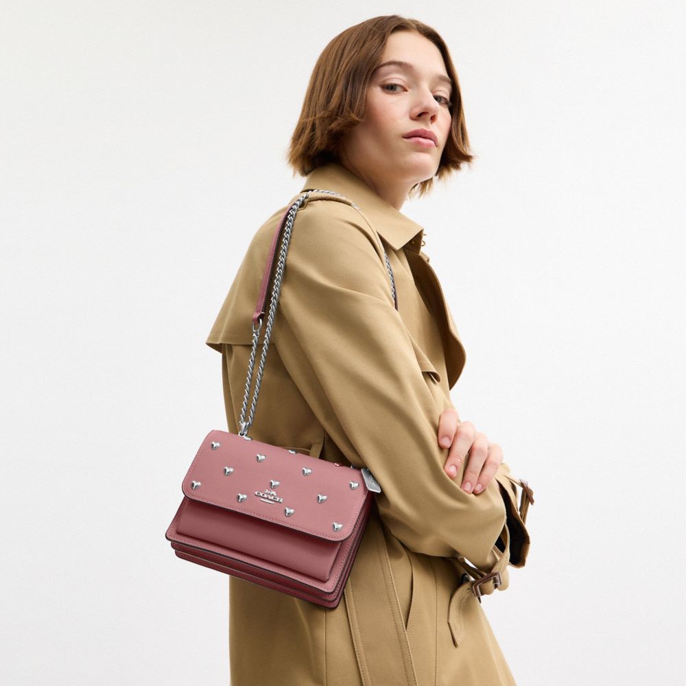 COACH®,Mini Klare Crossbody Bag With Heart Rivets,Leather,Crossbody,Metal,Logo,Heart Embellishment,Lined,Adjustable,Silver...,Blush,Detail View