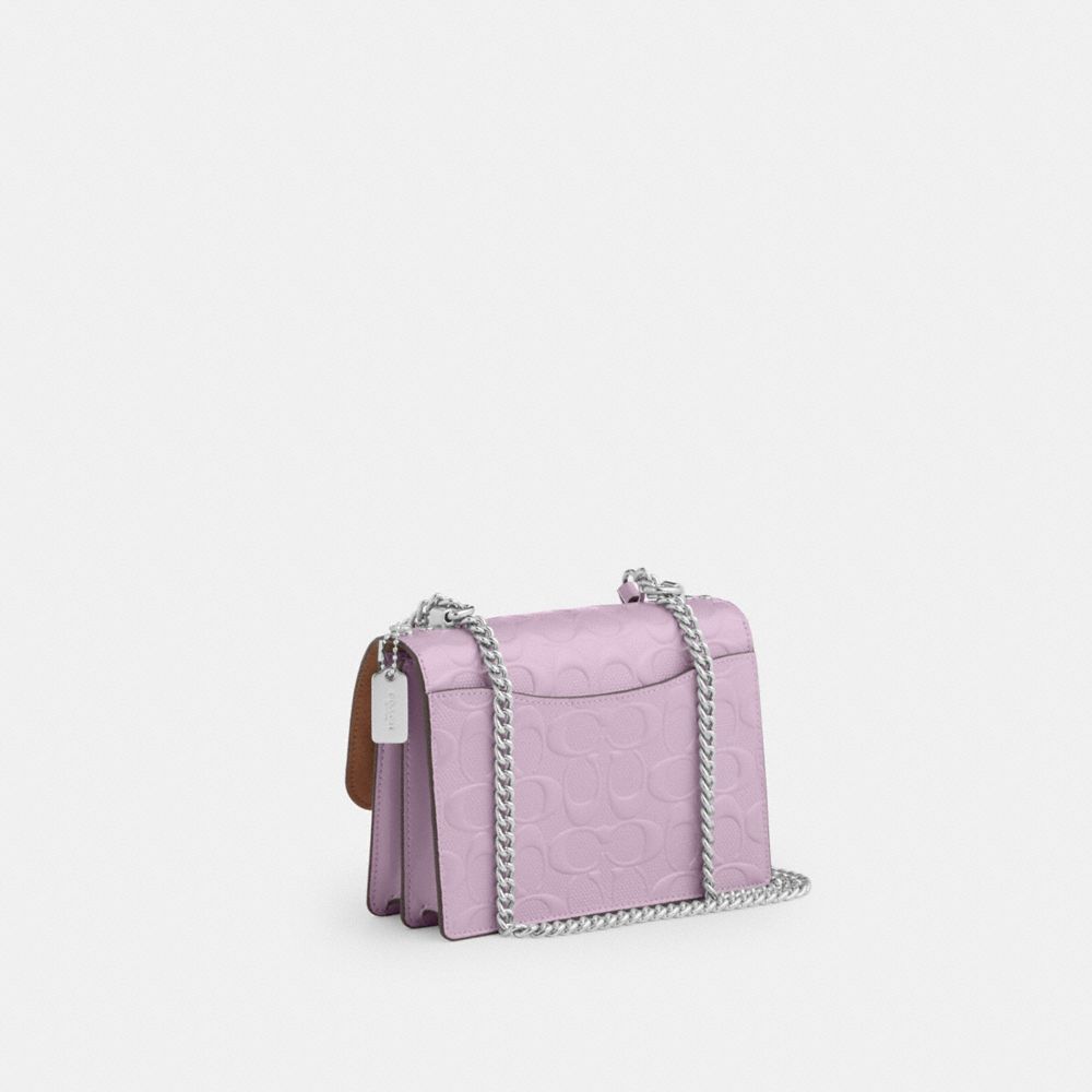 COACH®,Mini Klare Crossbody Bag In Signature Leather,Leather,Crossbody,Logo,Metal,Adjustable,Silver Metal,Day Party,Lavender,Angle View