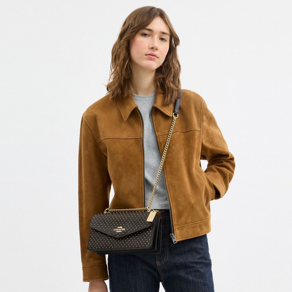 COACH®,Klare Envelope Crossbody Bag In Signature Canvas With Rivets,