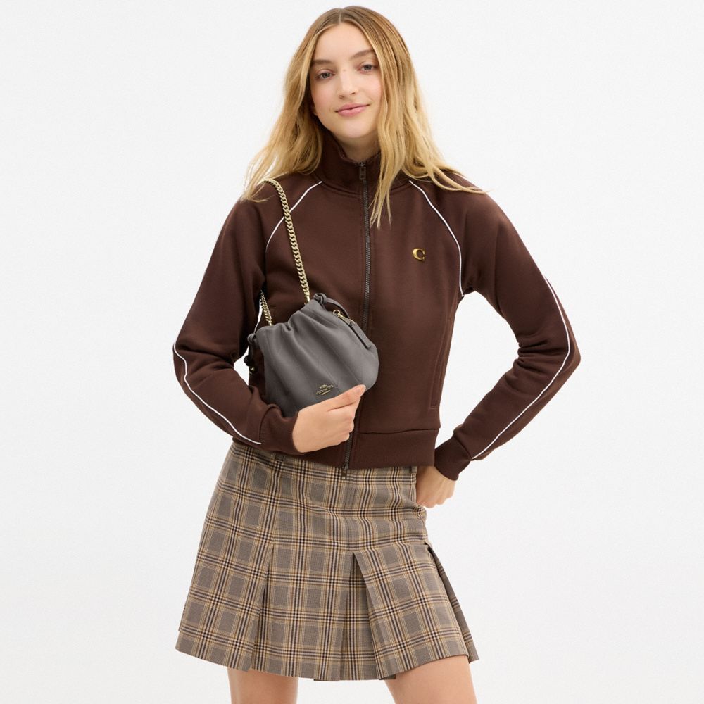 COACH®,Faye Mini Drawstring Bag With Quilting,Bucket,Logo,Metal,Adjustable,Shoulder Guard,Gold Metal,Day Party,Gray,Detail View