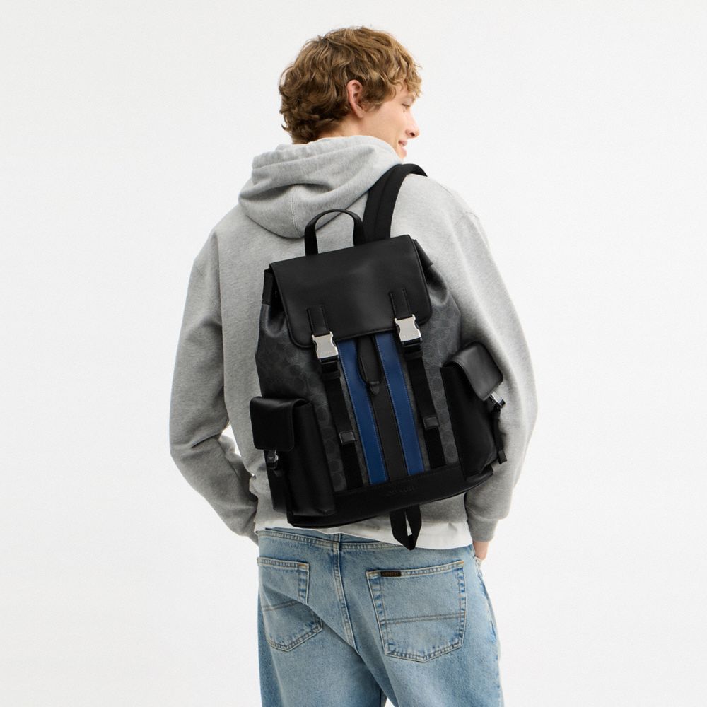 COACH®,Clark Backpack In Signature Canvas With Varsity Stripe,Canvas,Leather,Backpack,Logo,Stripe,Adjustable,Suitcase Slee...,Black,Detail View