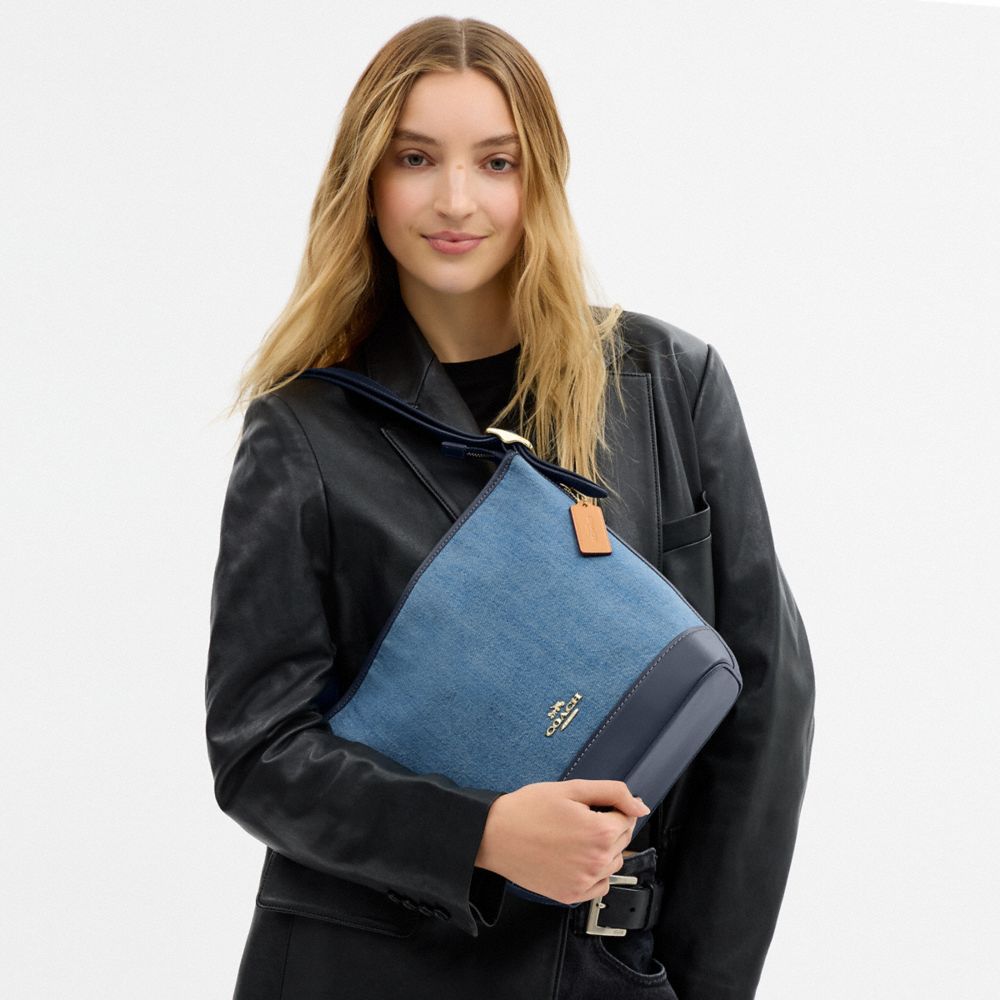 COACH®,Jude Duffle Bag In Signature Denim,Cotton,Leather,Denim,Crossbody,Piping,Color Block,Adjustable,Casual,Blue,Detail View