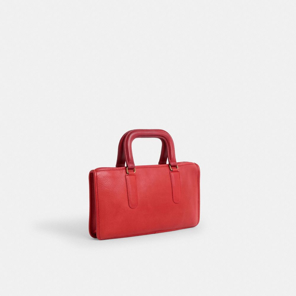 COACH®,Vintage Slim Handle Clutch,,Angle View