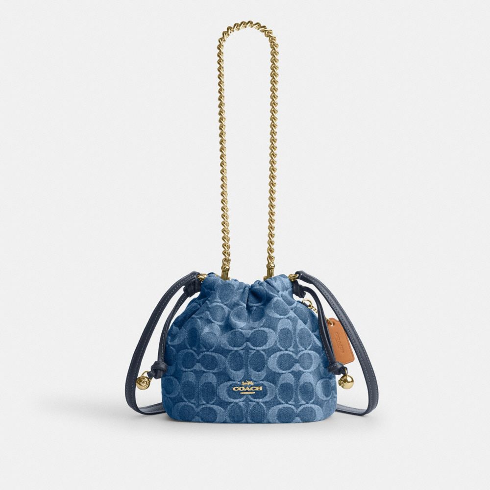 COACH®,Faye Mini Drawstring Bag In Signature Denim,Navy,Front View