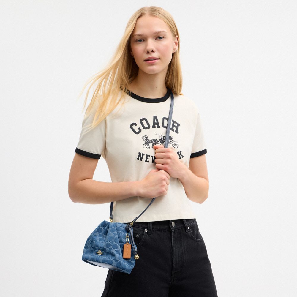 COACH®,Faye Mini Drawstring Bag In Signature Denim,Navy