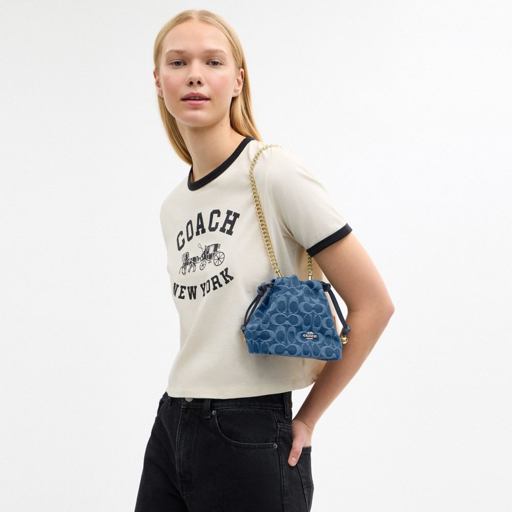 COACH®,Faye Mini Drawstring Bag In Signature Denim,Navy,Detail View