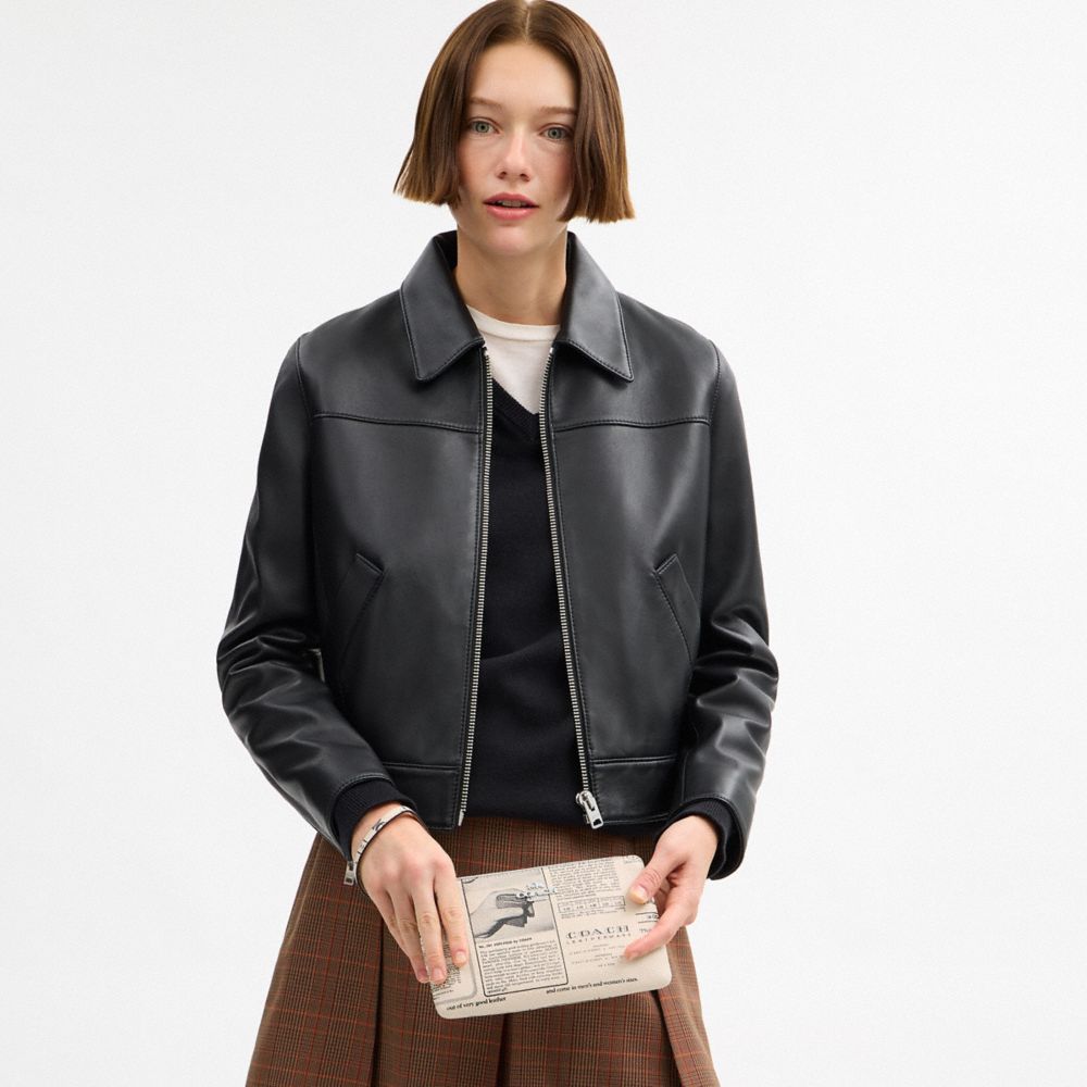 COACH®,Large Corner Zip Wristlet With Newspaper Print,Leather,Pouch,Wristlet,Logo,Metal,Casual,Cream,Detail View