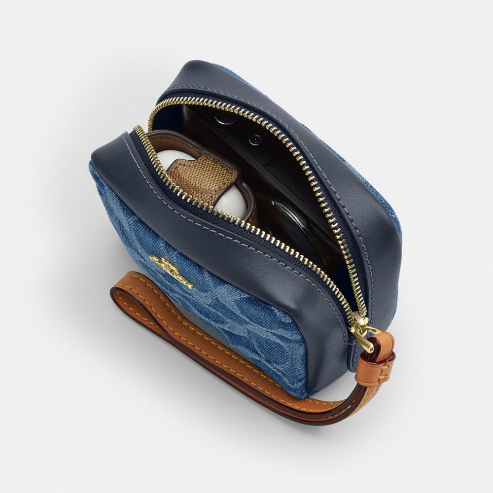 Pouch Wristlet In Signature Canvas | Wallets | Coach | COACH®