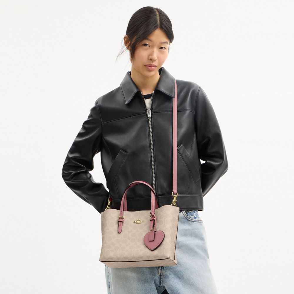 COACH®,Mollie Tote Bag 25 In Signature Canvas With Heart Charm,Beige