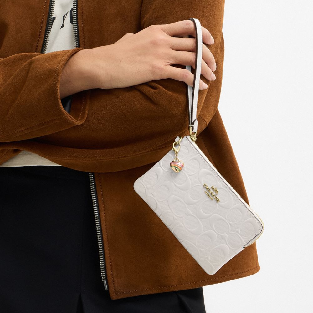 COACH®,Corner Zip Wristlet In Signature Leather With Heart Charm,Leather,Pouch,Wristlet,Embossed,Metal,Logo,Heart Embellis...,White,Detail View