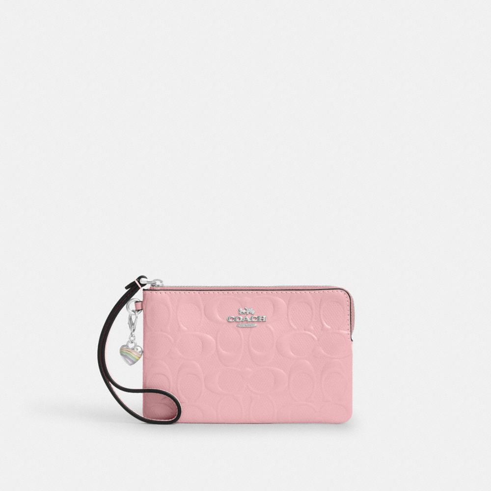 COACH®,WRISTLET À FERMETURE ZIPPÉE D’ANGLE EN CUIR EXCLUSIF AVEC BRELOQUE EN FORME DE CŒUR,Argenté,Front View