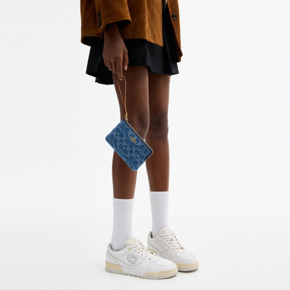 COACH®,Corner Zip Wristlet In Signature Denim,,Detail View