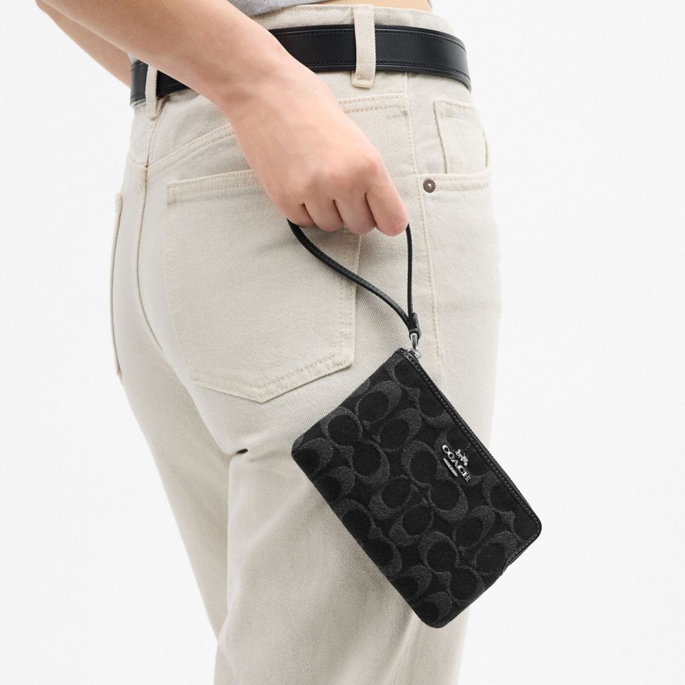 COACH®,Corner Zip Wristlet In Signature Denim,Denim,Leather,Cotton,Pouch,Wristlet,Metal,Logo,Casual,Black,Detail View