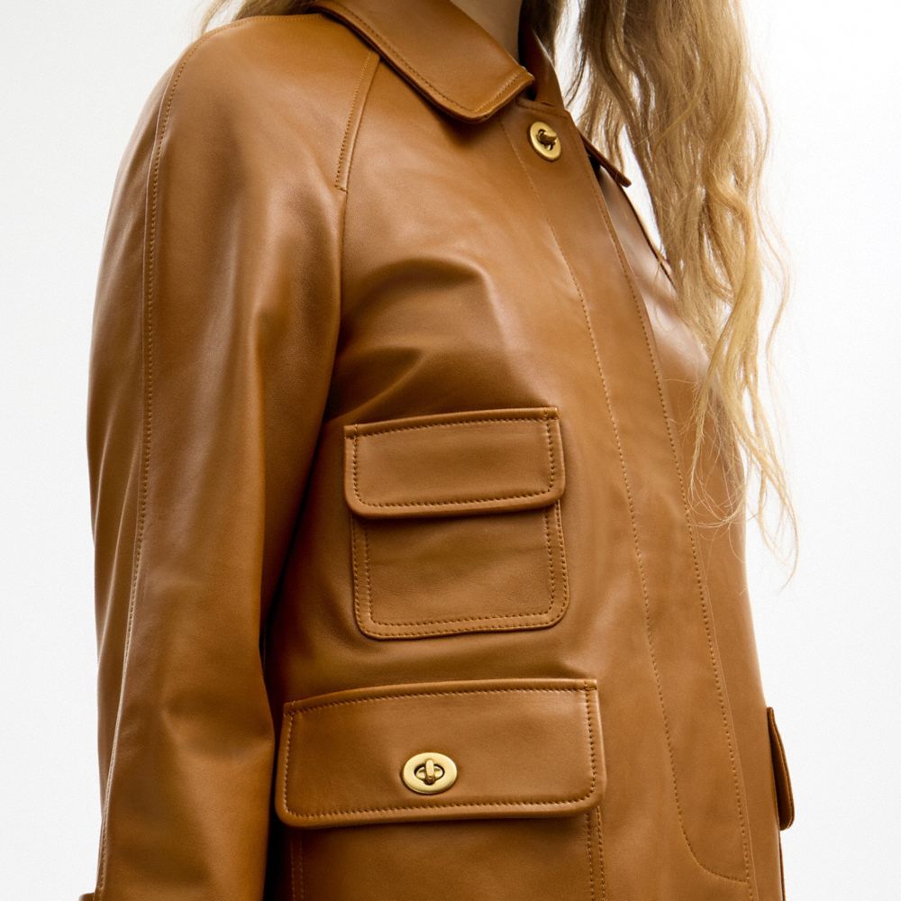 Женские куртки Coach Turnlock Leather Swing Coat — фото 4