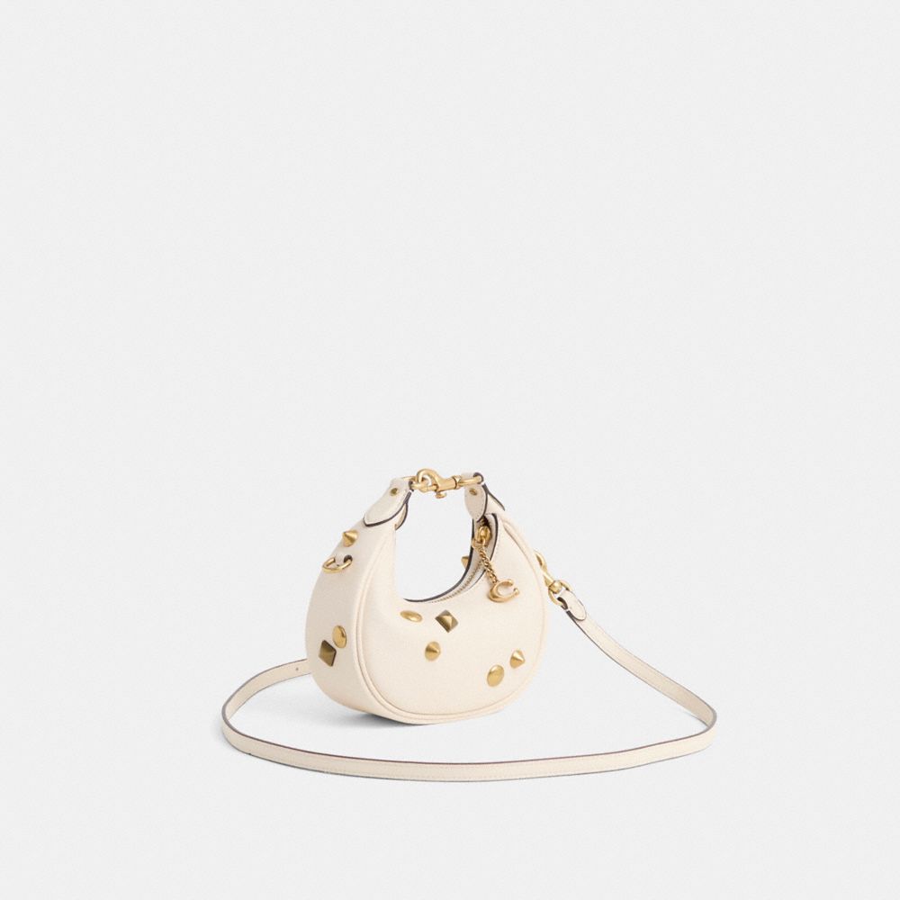 COACH®,Upcrafted Jonie Bag,Leather,Crossbody,Logo,Metal,Studded,Gold Metal,Day Party,Cream,Angle View