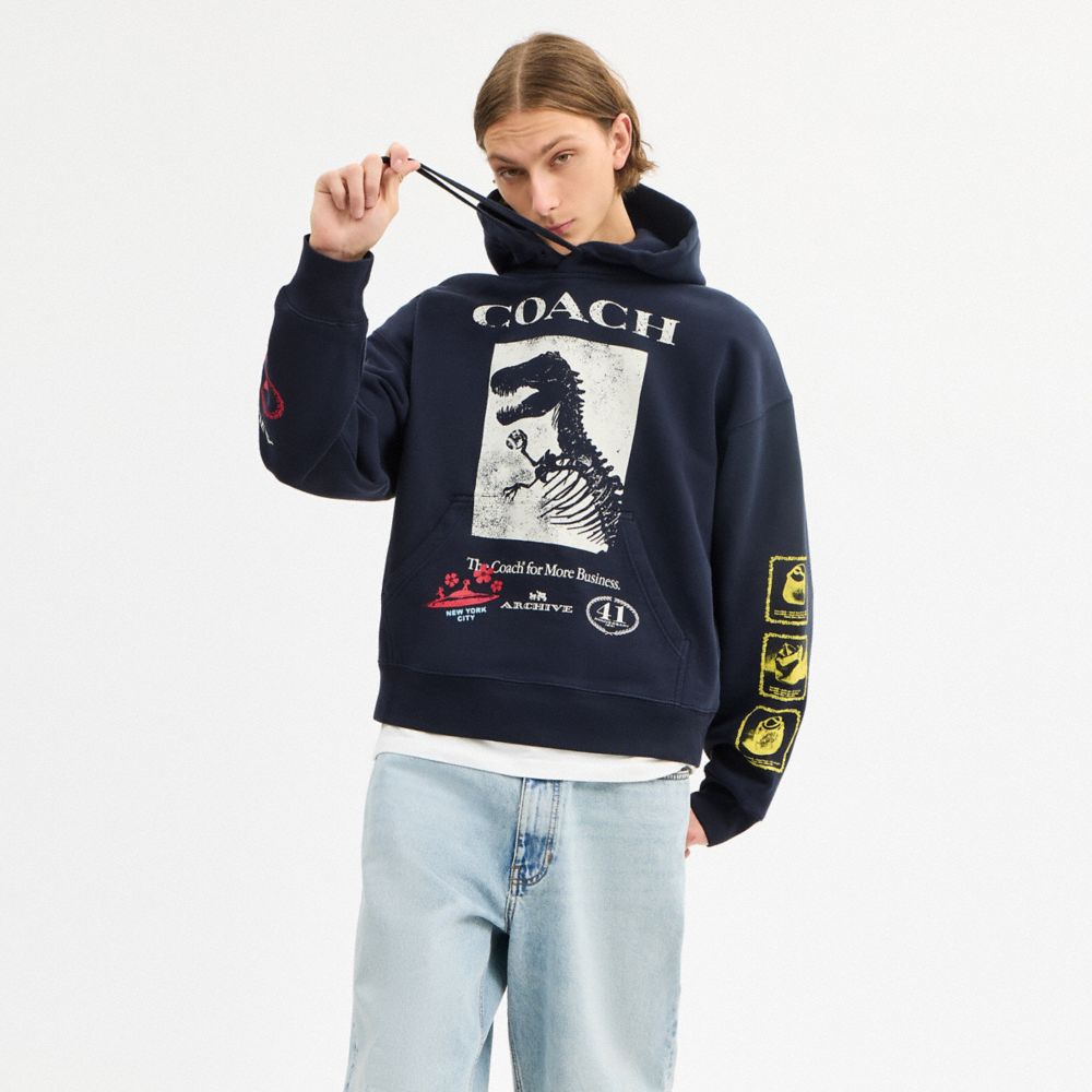 COACH®,Dinosaur Collage Relaxed Hoodie In Organic Cotton,Organic Cotton,Sweatshirt,Logo,Drawstring,Casual,Navy,Scale View