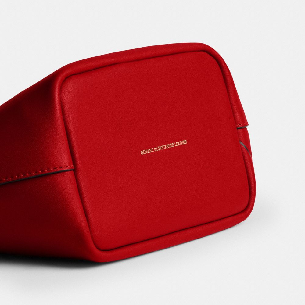 【DISNEY X COACH】キスロック フレーム バッグ / プルート 3