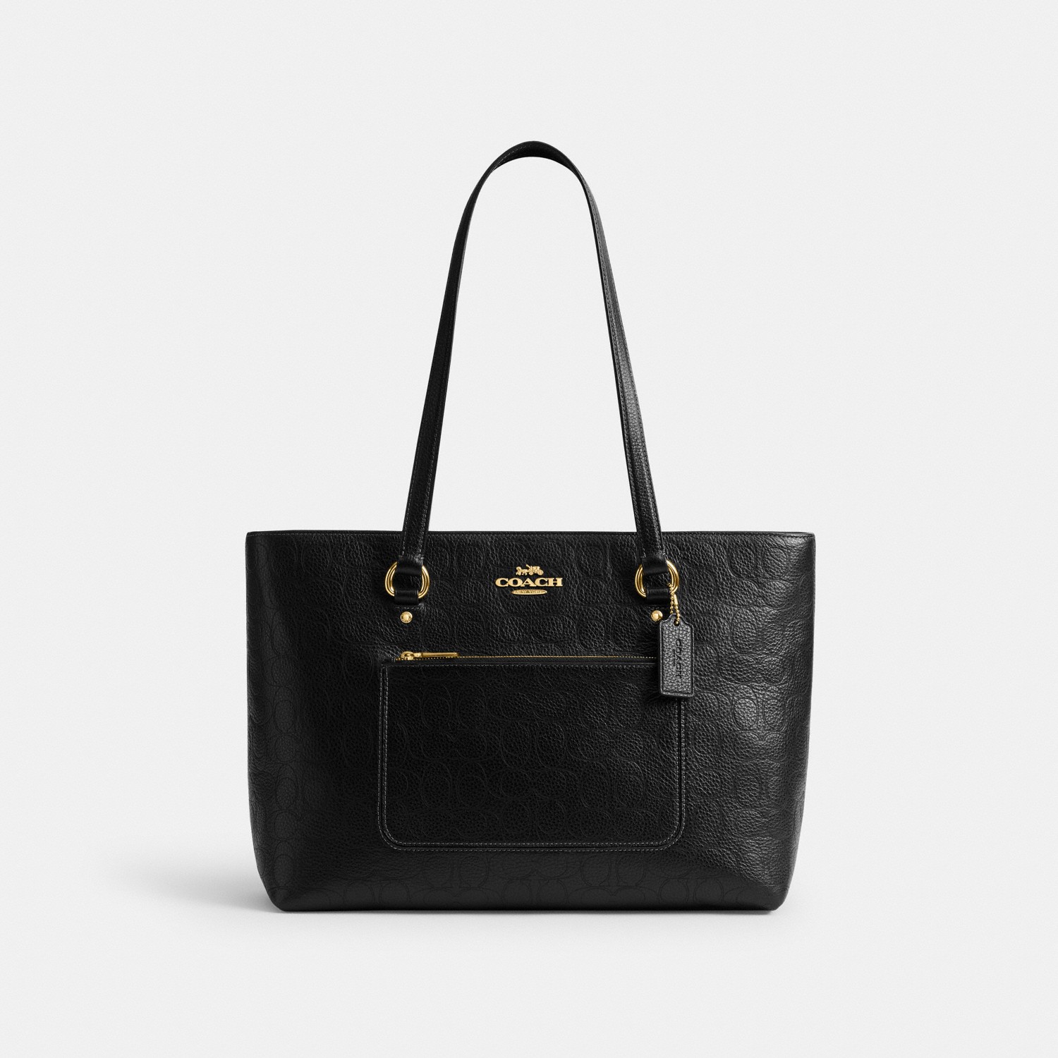 Coach Station Tote in black signature pebble leather