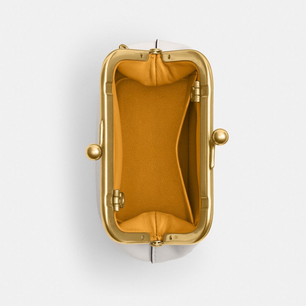 【DISNEY X COACH】キスロック フレーム バッグ 10 / ステッカー プリント 10