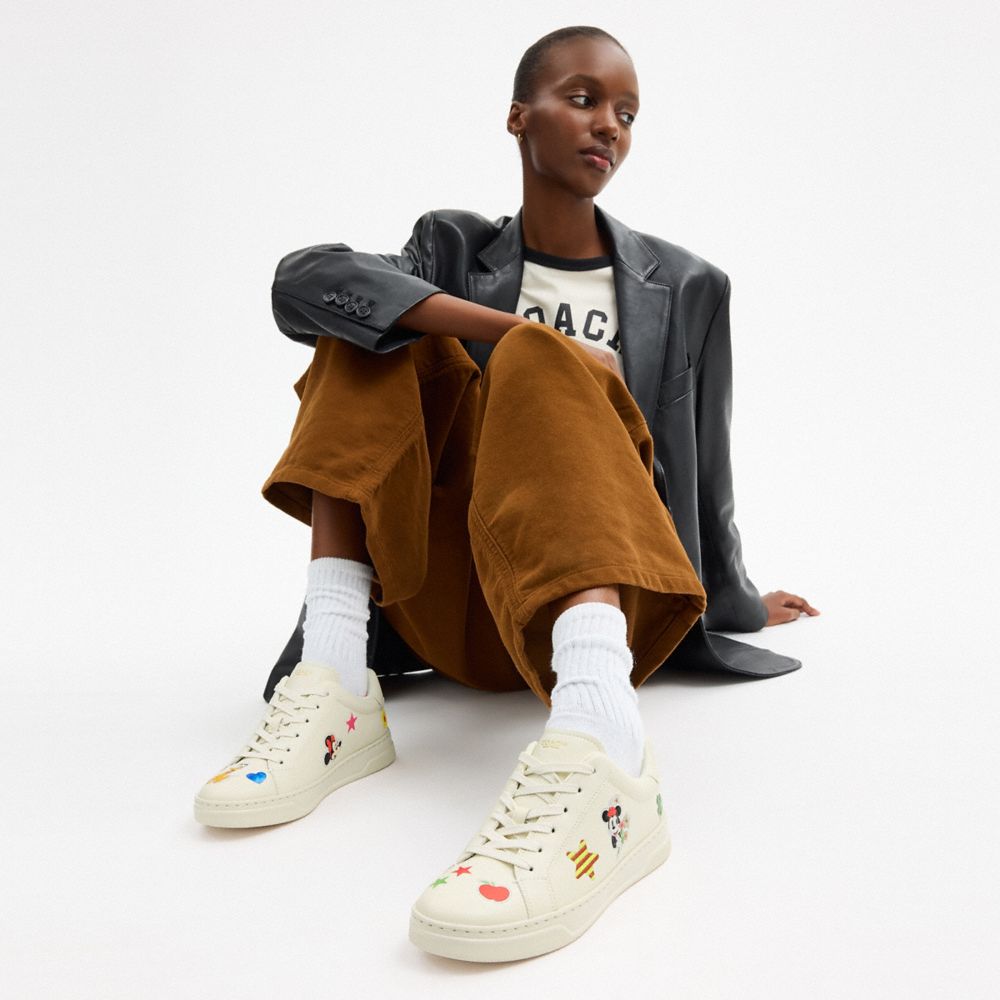 COACH®,Disney X Coach High Line Sneaker With Sticker Print,Leather,EVA,Low Top,Casual,Fabric,Flexible Insole,Flexible,Cush...,Cream,Detail View