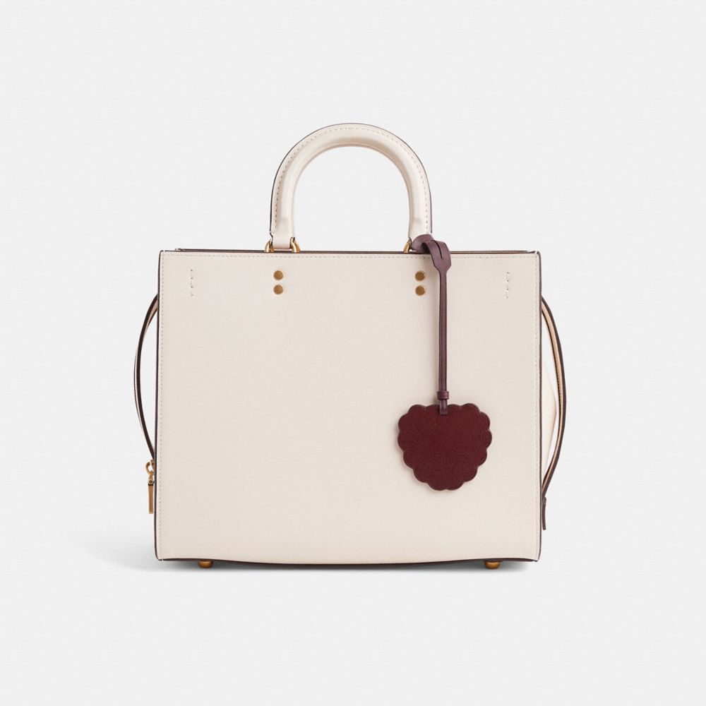 COACH®,Remade Raspberry Bag Charm,,Angle View