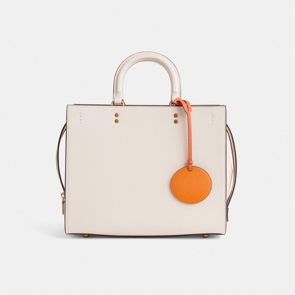 COACH®,Remade Orange Bag Charm,,Angle View