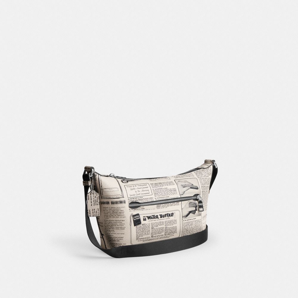 COACH®,Small Finn Crossbody Bag With Pouch And Newspaper Print,Multi Color,Angle View
