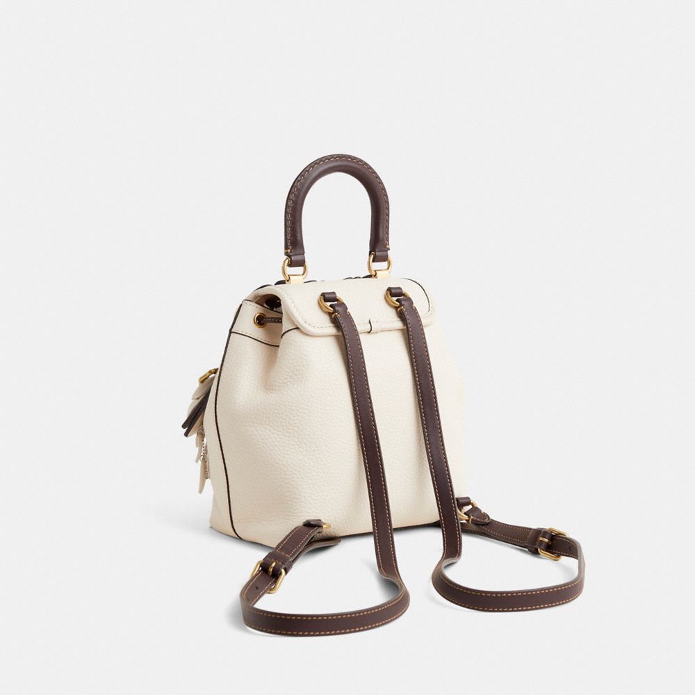 COACH®,Upcrafted Riya Backpack 21,Leather,Bucket,Logo,Studded,Applique,Metal,Gold Metal,Day Party,Cream,Angle View