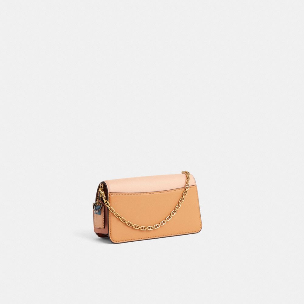 COACH®,Upcrafted Beat Crossbody Clutch,Suede,Leather,Calf Hair,Clutch,Plastic,Rubber,Faux Leather,Pattern,Color Block,Logo...,Multi Color,Angle View