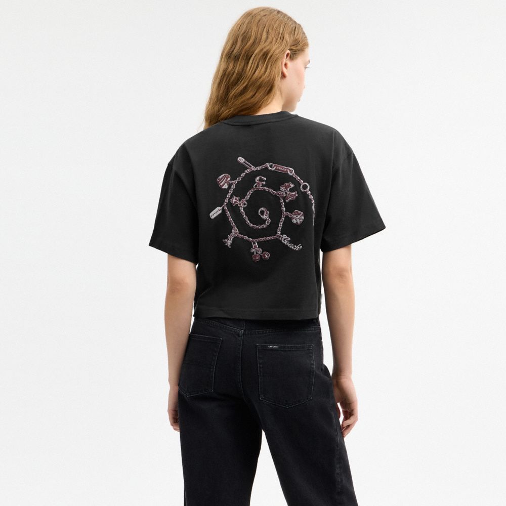 COACH®,Charms Cropped T-Shirt In Organic Cotton,Organic Cotton,T Shirt,Logo,Graphic,Casual,Black,Scale View