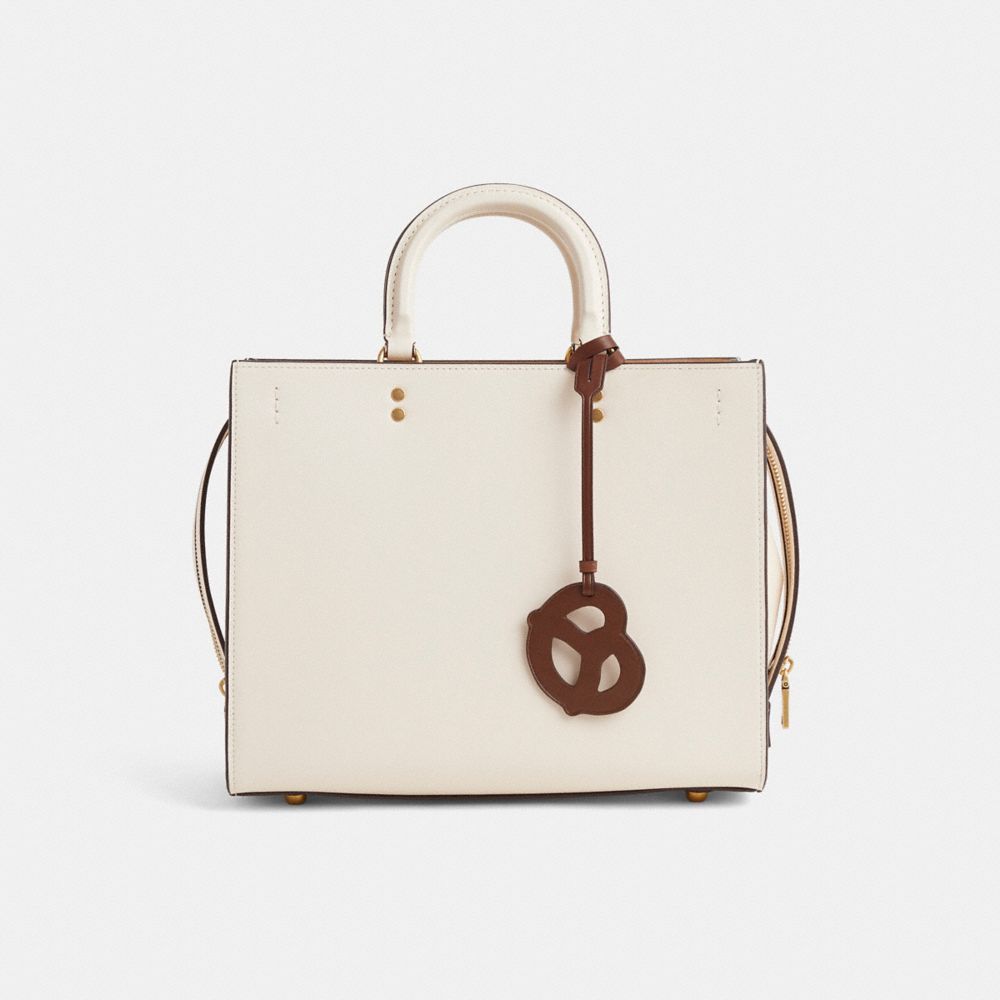 COACH®,Remade Pretzel Bag Charm,Brown,Angle View