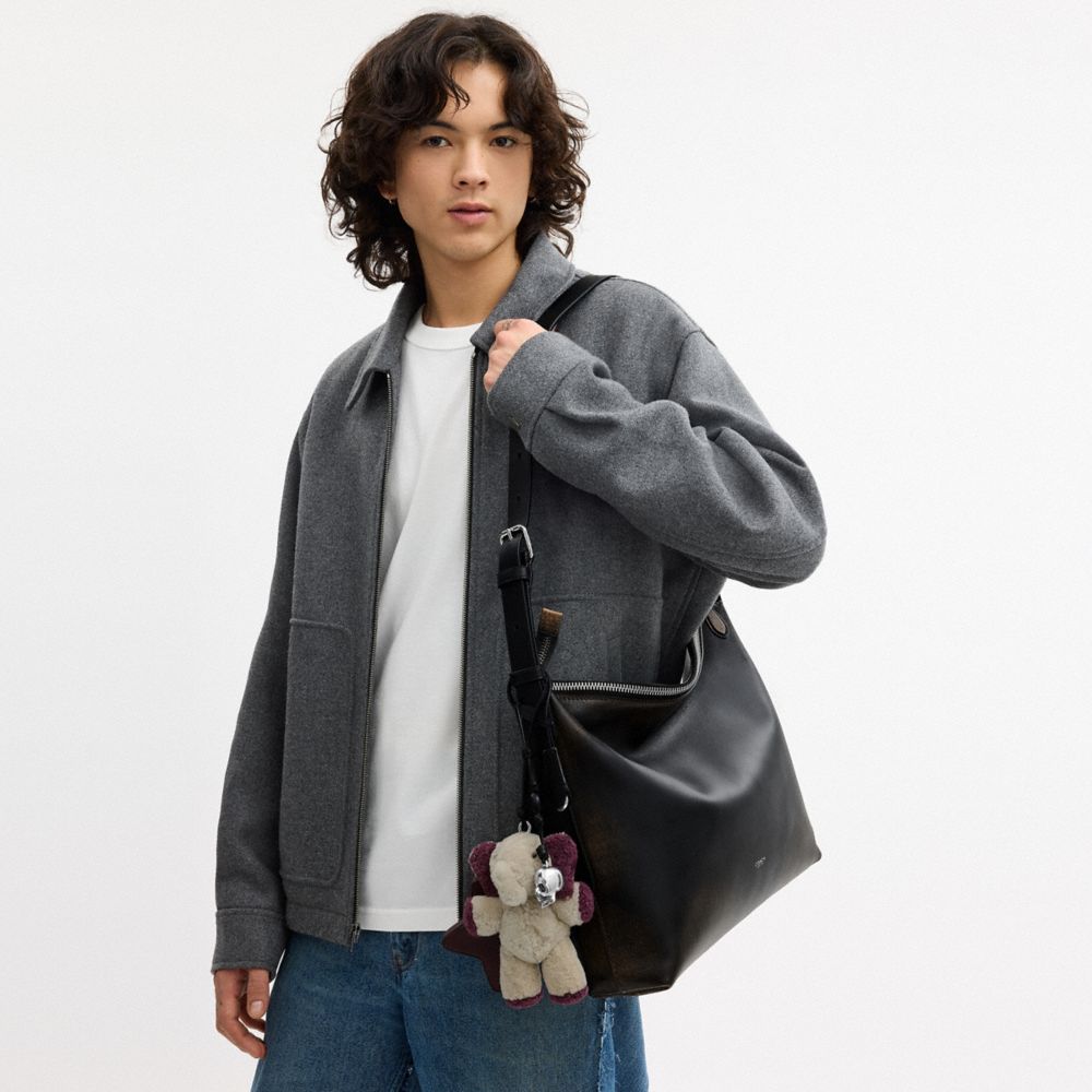 COACH®,Mott Messenger Bag 38 In Loved Leather With Charms,,Detail View