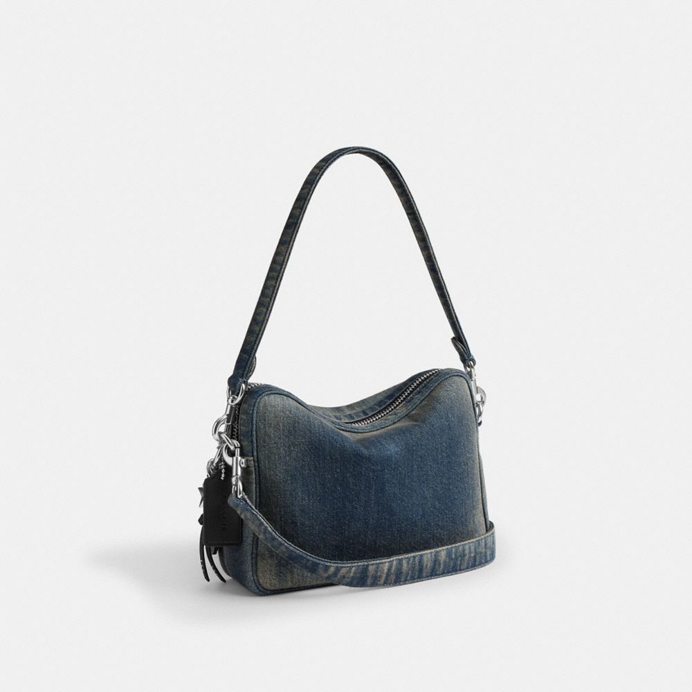 COACH®,Dakota Crossbody Bag In Regenerative Cotton Denim With Charms,,Angle View