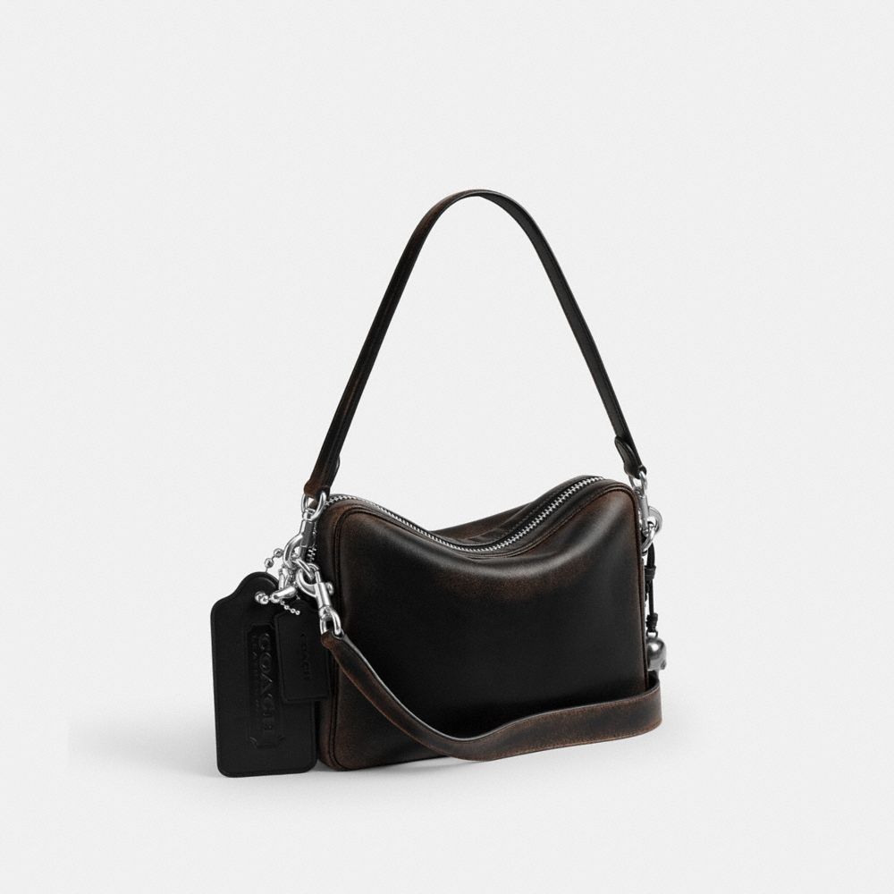 COACH®,Dakota Crossbody Bag In Loved Leather With Charms,,Angle View