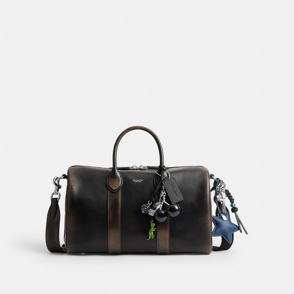 COACH®,Compass Bag 35 In Loved Leather With Charms,,Front View