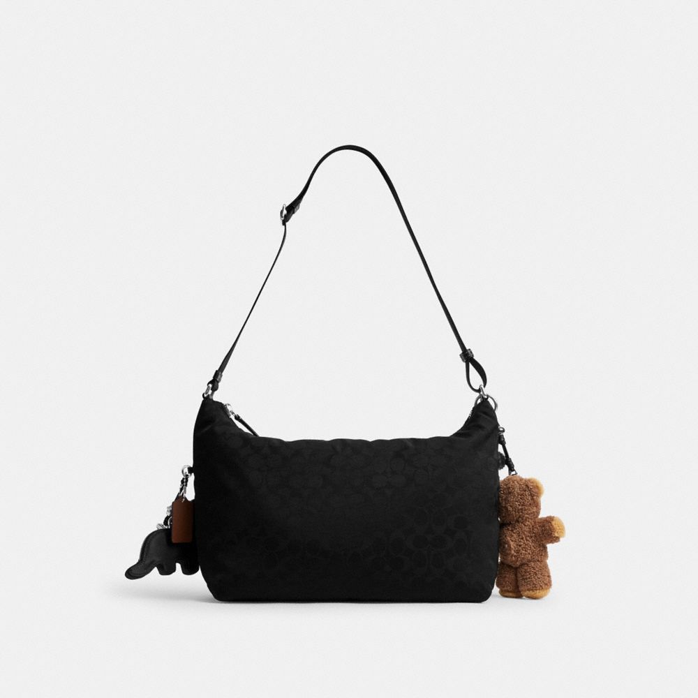 COACH®,Leo Crossbody In Signature Nylon With Charms,,Back View