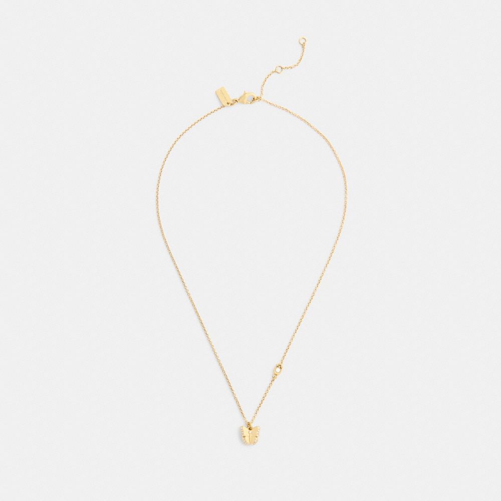 COACH®,Butterfly Pendant Necklace,Single Strand,Cubic Zirconia,Glass,Gem Embellishment,Novelty Embellishment,Logo,Letterin...,Gold,Inside View,Top View