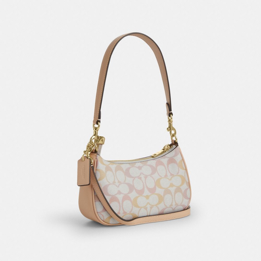 COACH®,Teri Mini Crossbody Bag In Pretty Signature Canvas,,Angle View
