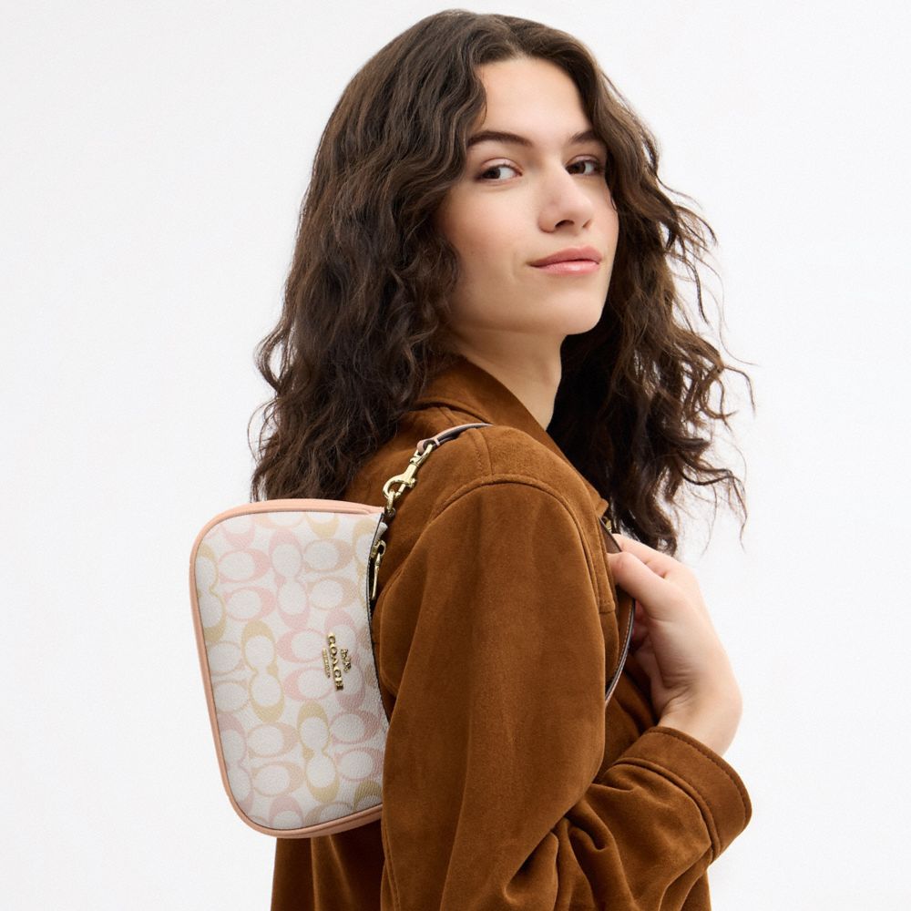 COACH®,Teri Mini Crossbody Bag In Signature Canvas,,Detail View