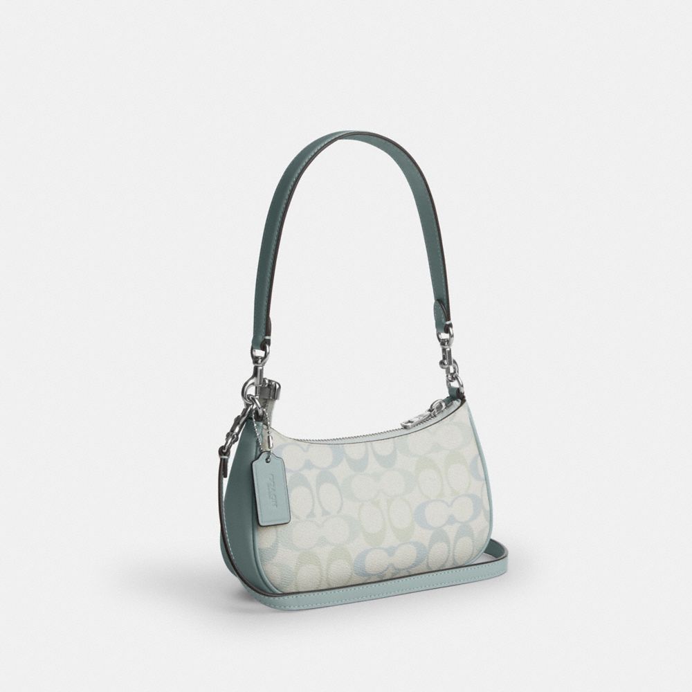 COACH®,Teri Mini Crossbody Bag In Pretty Signature Canvas,,Angle View