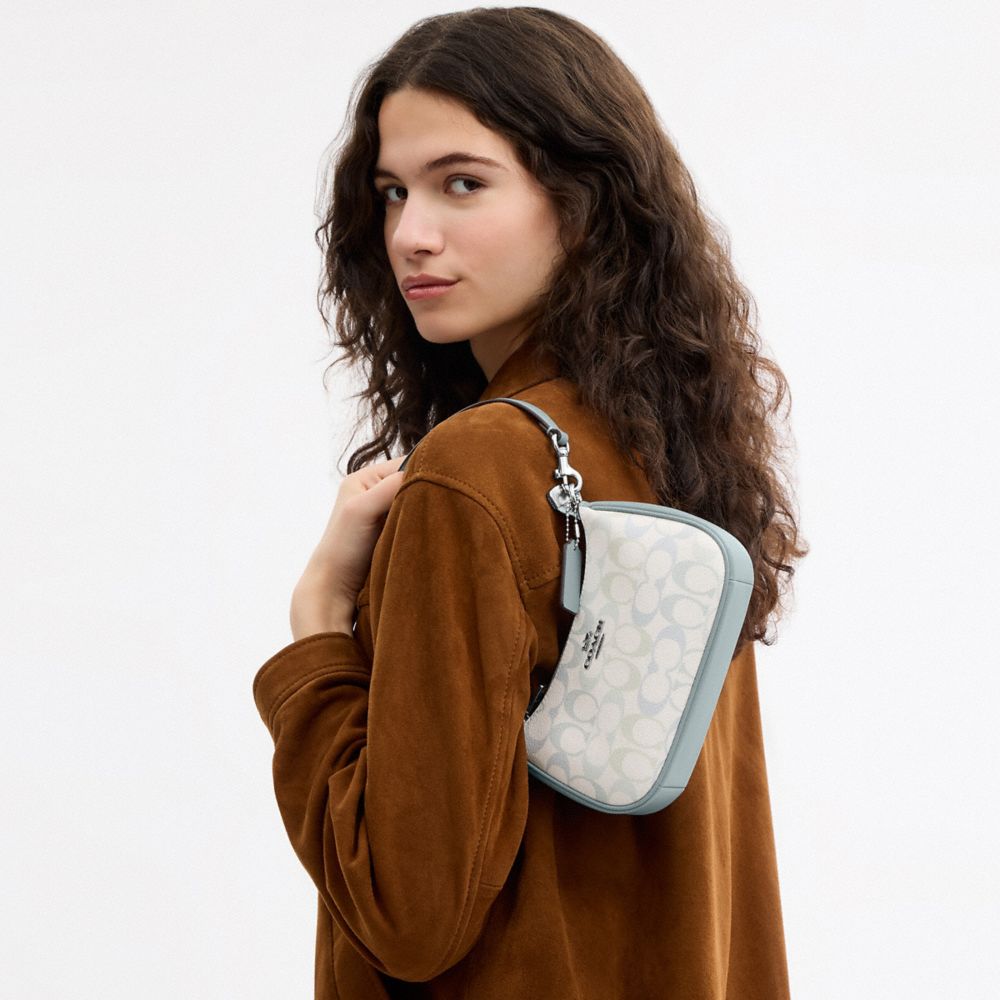 COACH®,Teri Mini Crossbody Bag In Signature Canvas,,Detail View