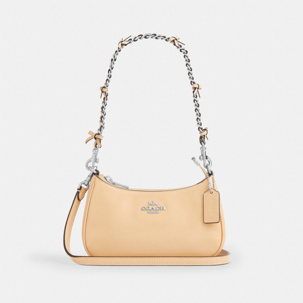 COACH®,MINI SAC BANDOULIÈRE TERI AVEC NŒUDS,Cuir froissé,Argent/Sable pâle,Front View