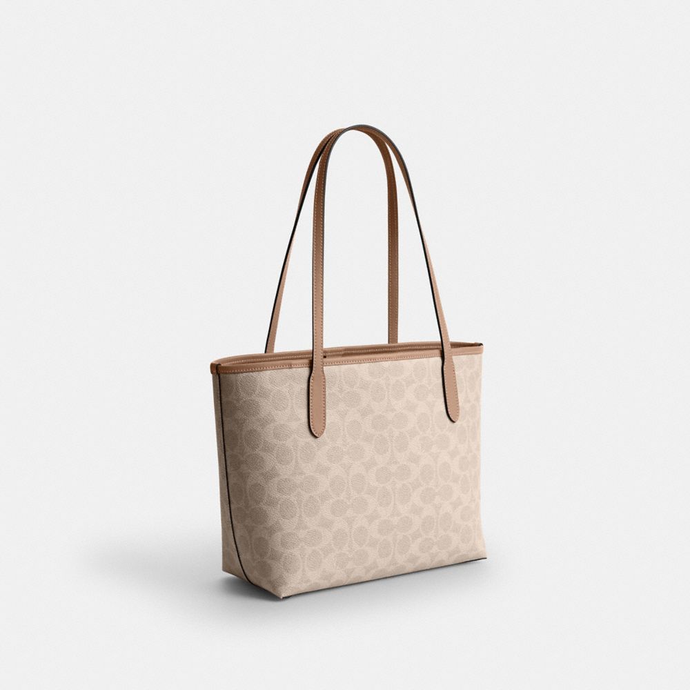 COACH®,Medium City Tote Bag In Signature Canvas,,Angle View