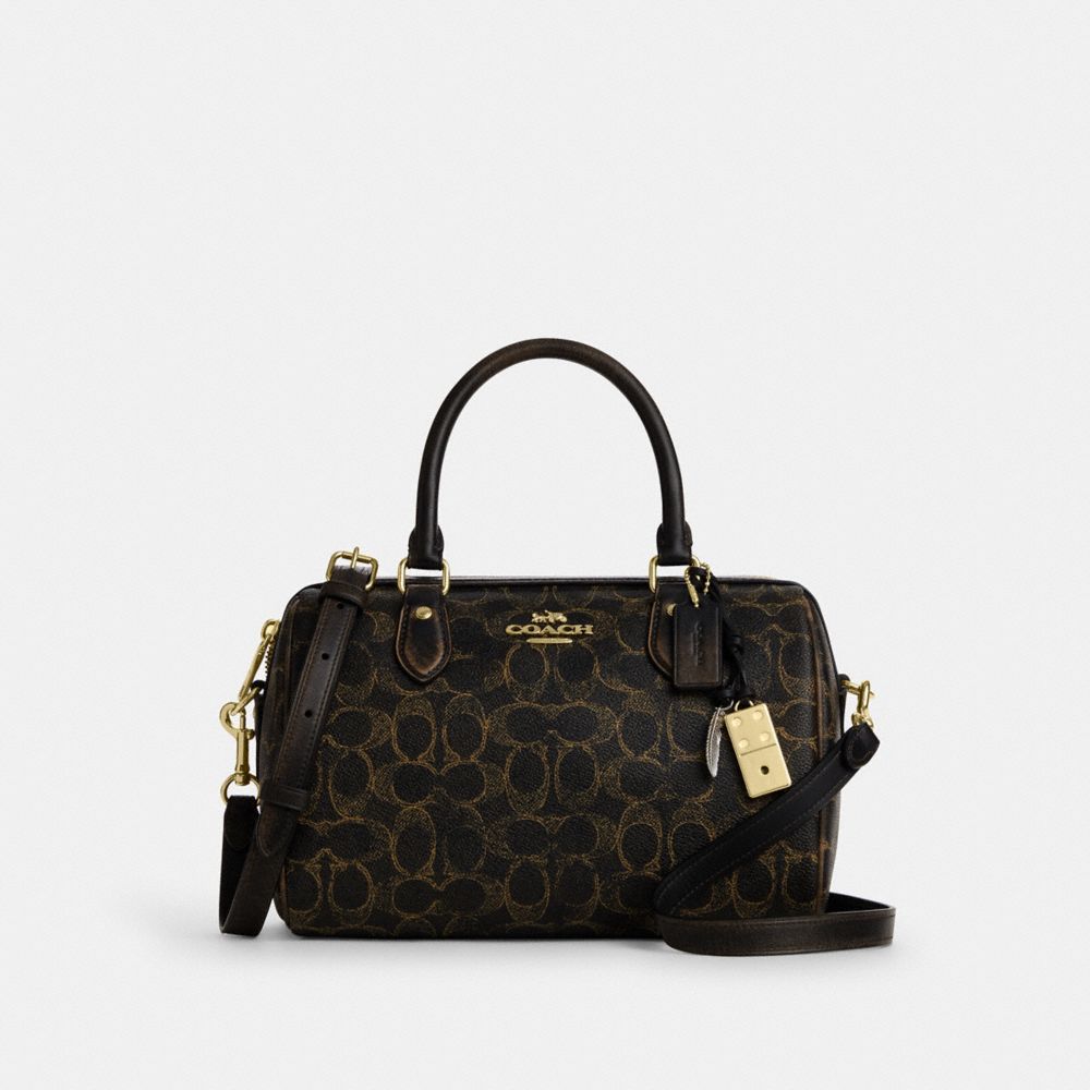 COACH®,SACOCHE ROWAN EN TOILE EXCLUSIVE VIEILLIE AVEC BRELOQUES,Toile exclusive,Or/Brun,Front View