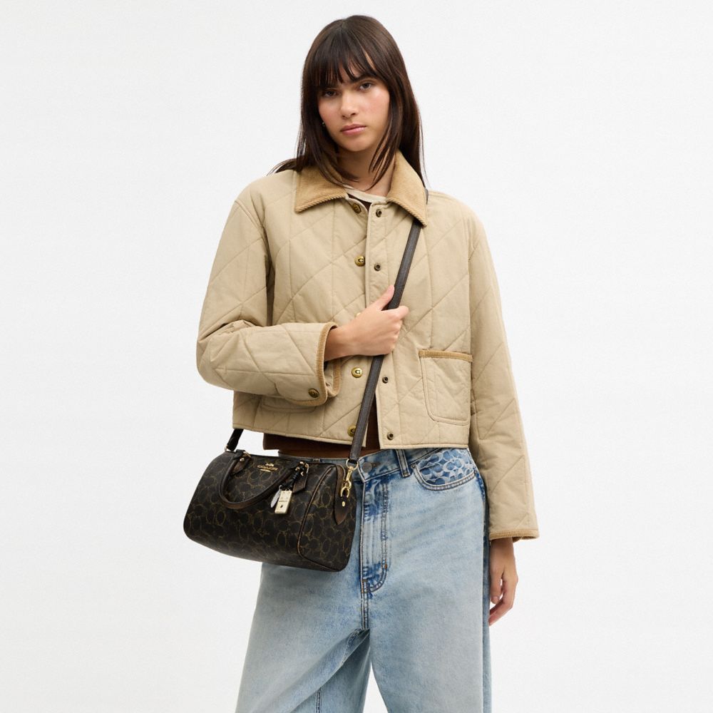 COACH®,SACOCHE ROWAN EN TOILE EXCLUSIVE VIEILLIE AVEC BRELOQUES,Toile exclusive,Or/Brun