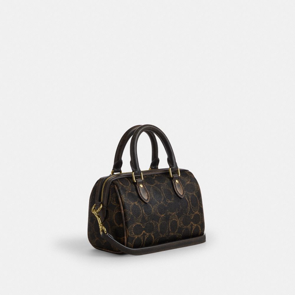 COACH®,Mini Rowan Crossbody Bag In Loved Signature Canvas With Charms,Leather,Recycled Polyester,Canvas,Barrel Bag,Metal,3...,Black,Angle View