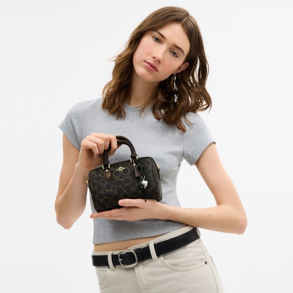 COACH®,Mini Rowan Crossbody Bag In Loved Signature Canvas With Charms,Leather,Recycled Polyester,Canvas,Barrel Bag,Metal,3...,Black,Detail View