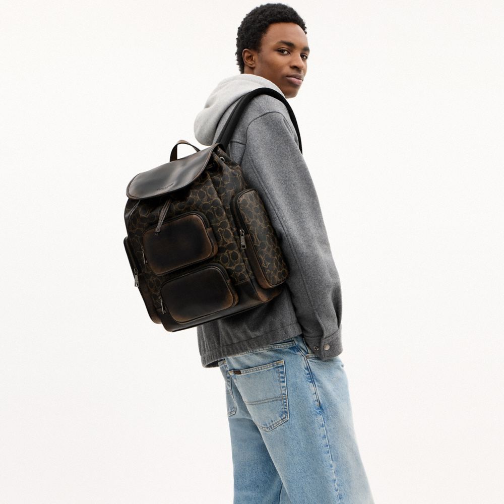 COACH®,Finn Backpack In Loved Signature Canvas,Leather,Canvas,Recycled Polyester,Backpack,Logo,Adjustable,Suitcase Sleeve,...,Multi Color,Detail View