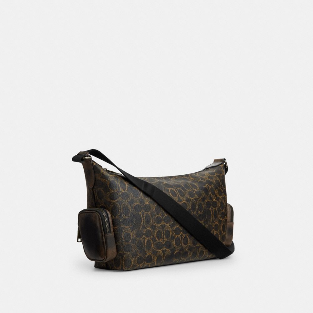 COACH®,Finn Crossbody Bag With Pockets In Loved Signature Canvas,Leather,Canvas,Recycled Polyester,Crossbody,Logo,Lined,Ad...,Multi Color,Angle View